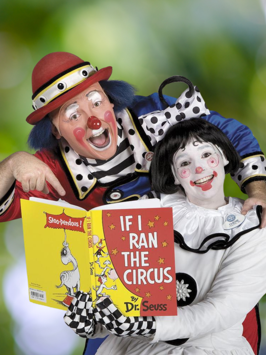Two excited-looking clowns read the book "If I Ran the Circus" by Dr. Seuss.