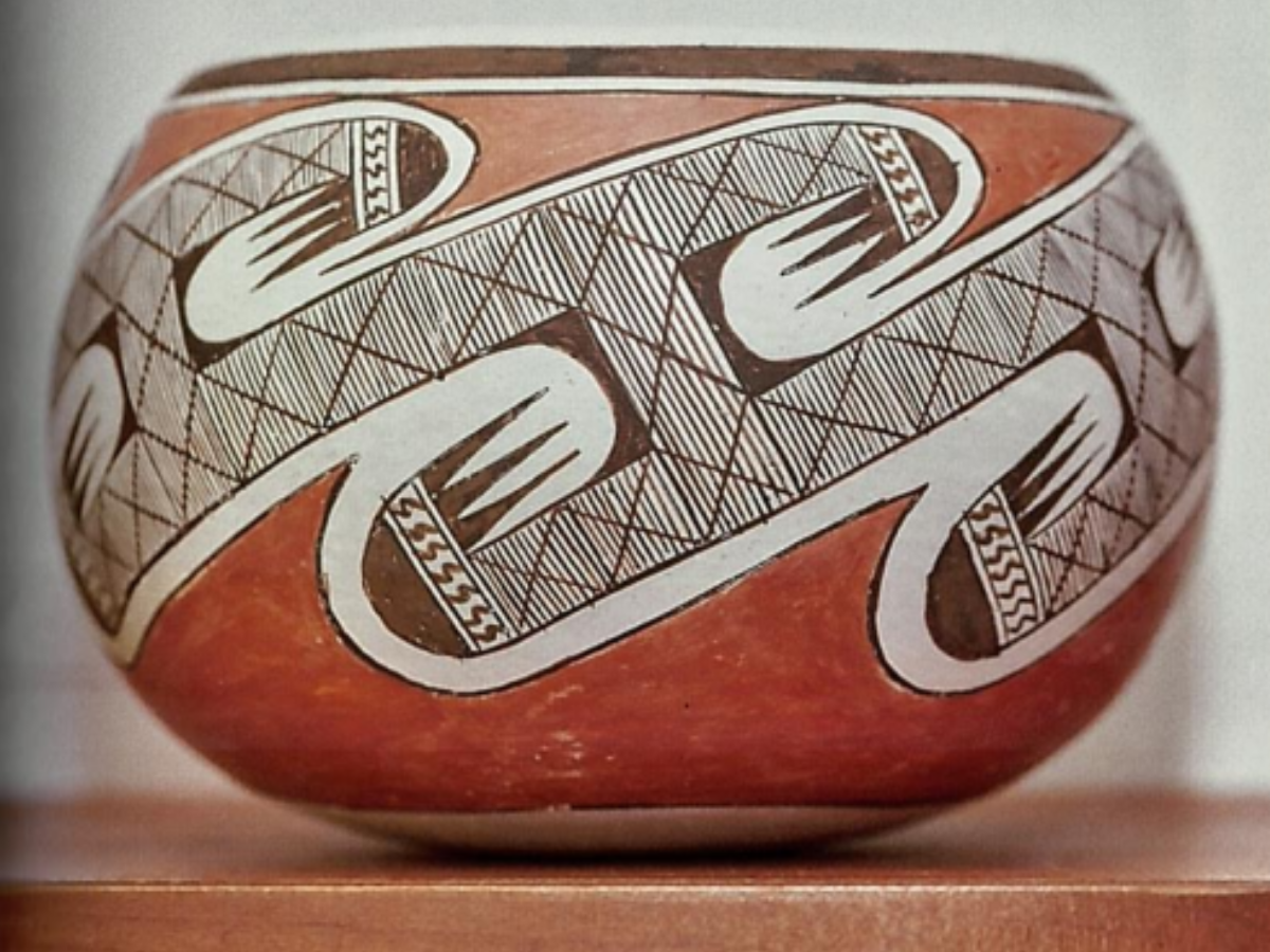 closeup of a clay red, white, and black Zuni olla by Daisy Nampeyo