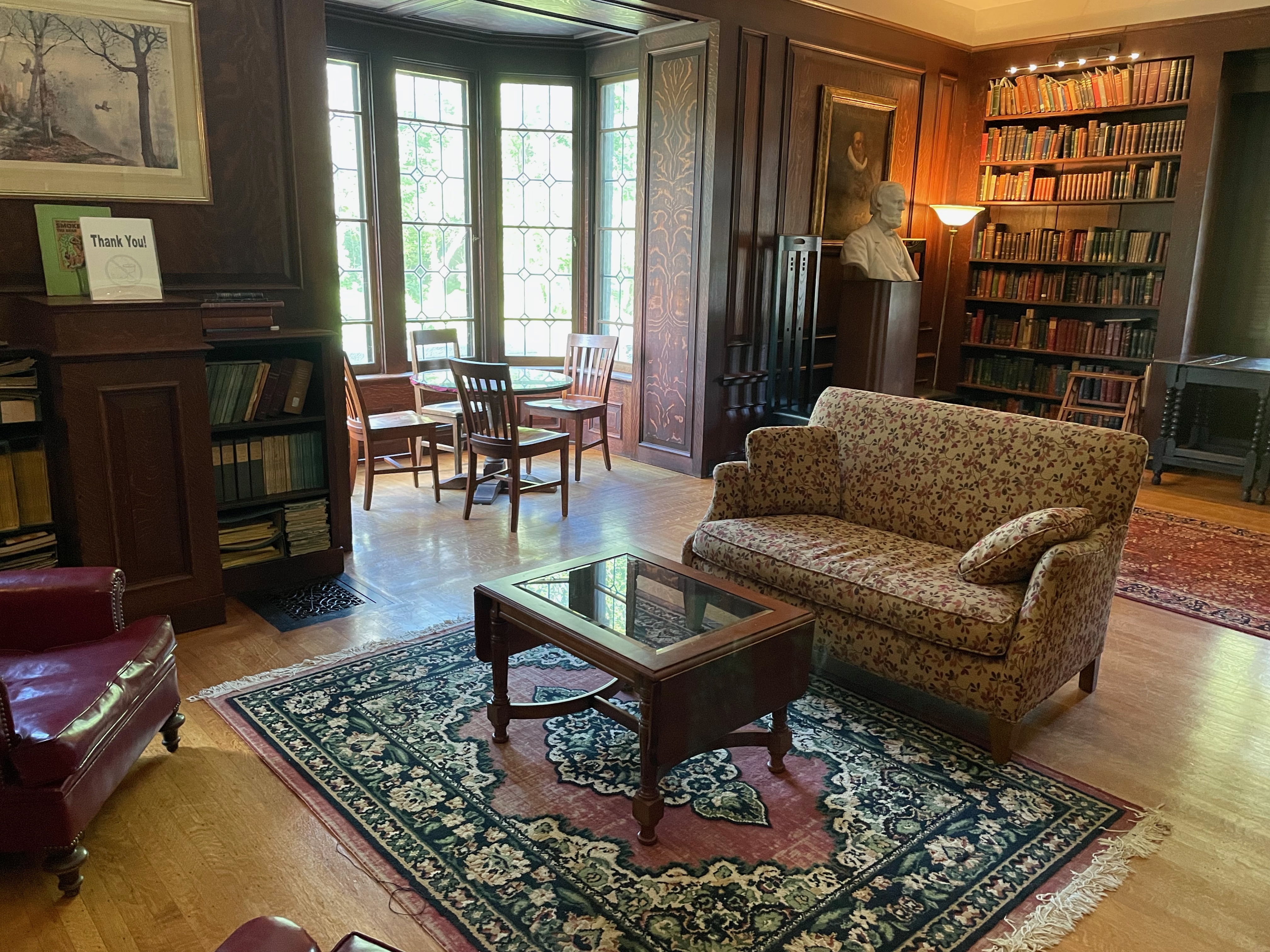 sofa with worktable/chairs in window