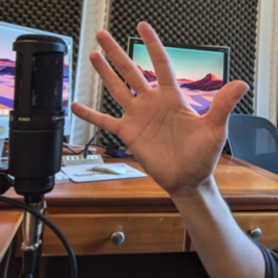 podcasting mic with hand for spacing